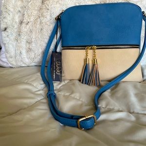 SUGU lightweight medium crossbody bag. NWT